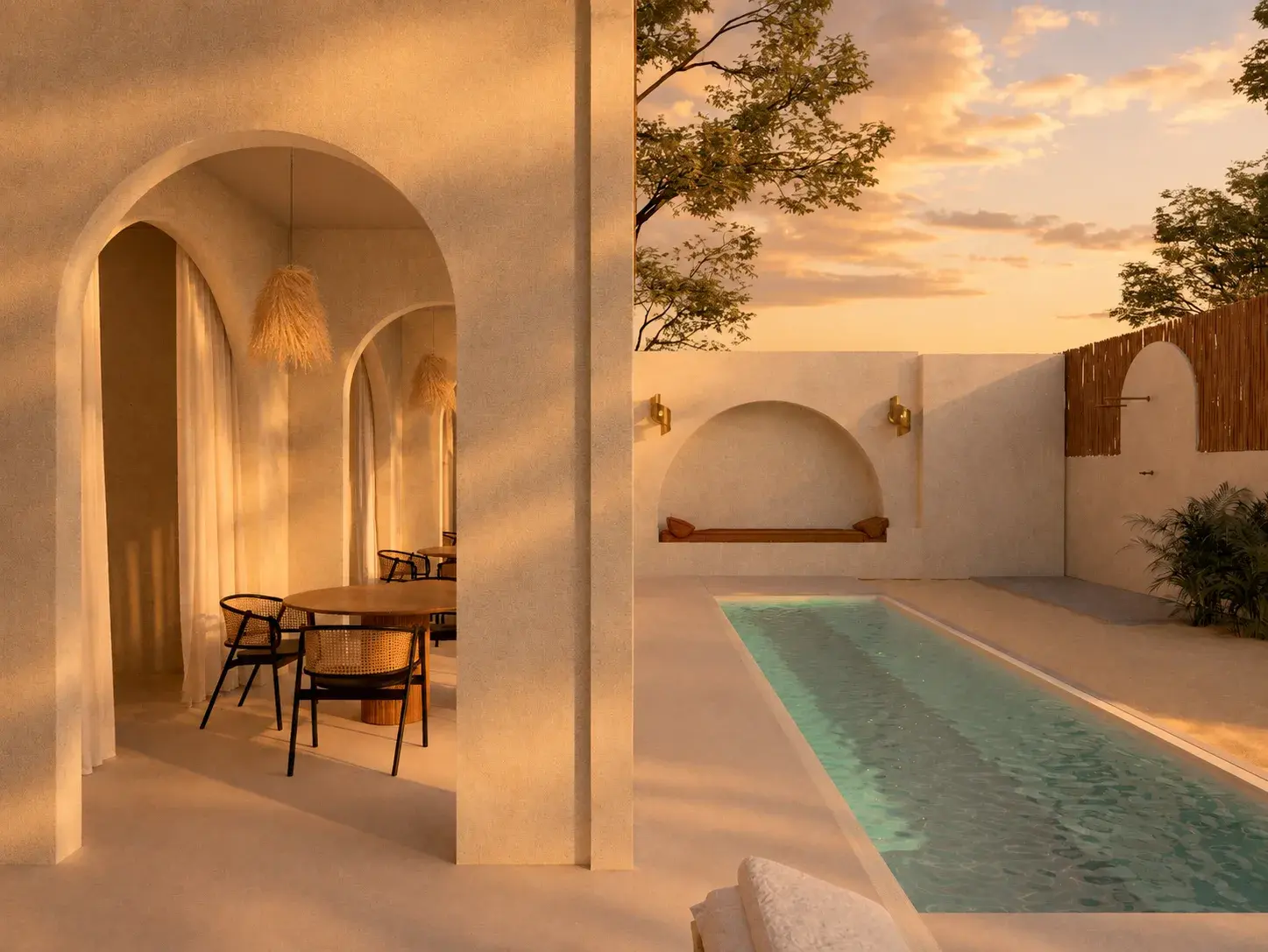 Pool and dining area at sunset